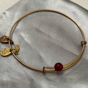 Alex and Ani Bracelets. 5 bracelets: 4 Gold, 1 Silver.